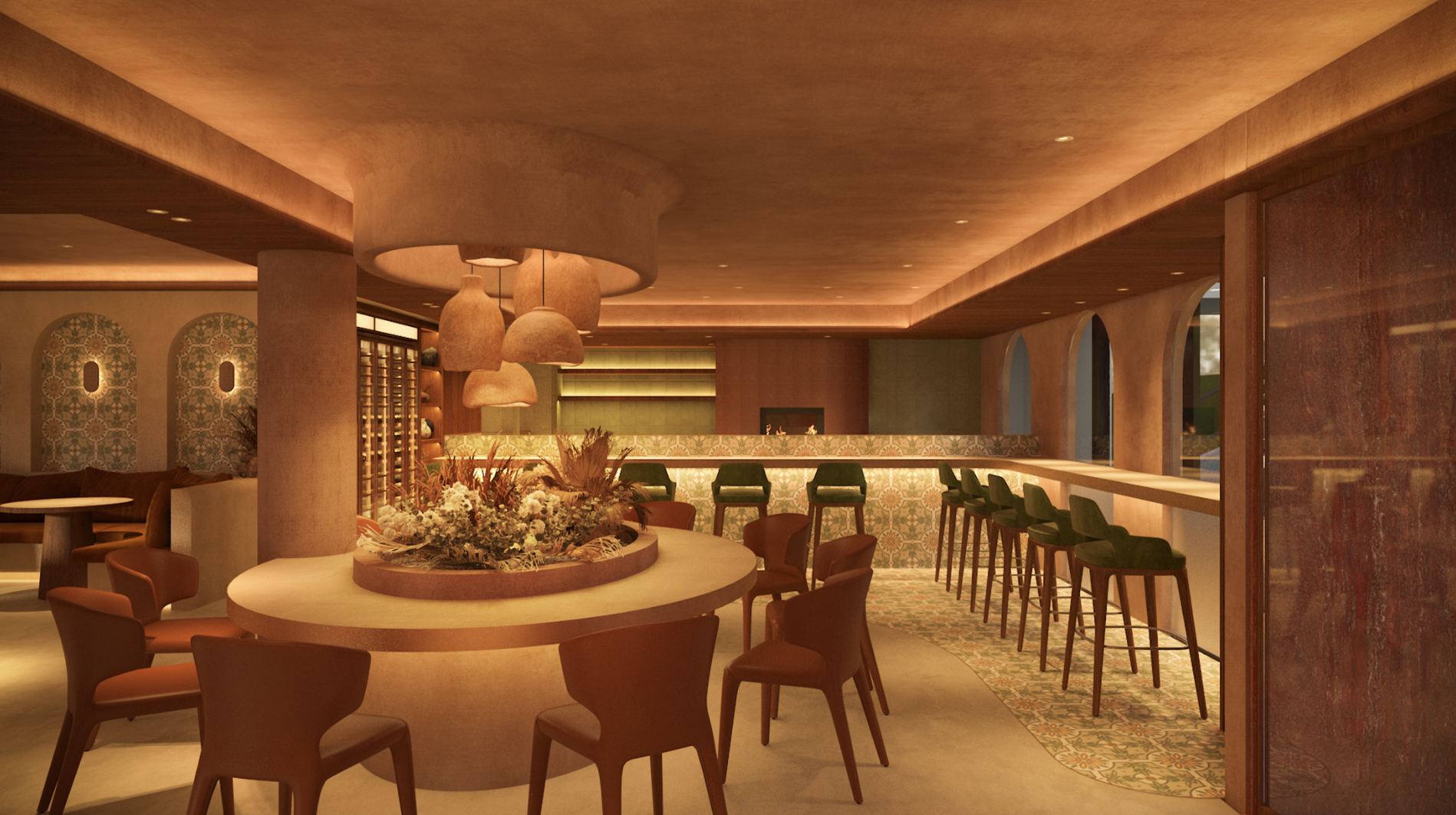 Warmly lit Petra dining room with a central table and bar